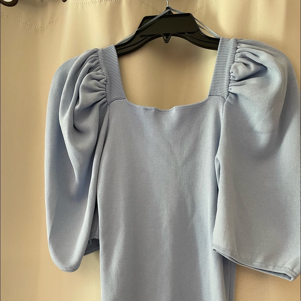 Knit top with puffy sleeves